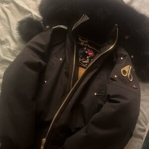 Moose Knuckles Black Puffer Jacket with Fur Trim